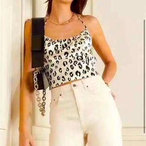 Reformation silk snow leopard top in xs. Worn once and in excellent condition.